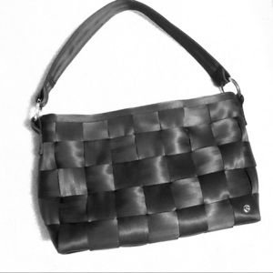 Harvey’s Mercedes-Benz Seatbelt Purse